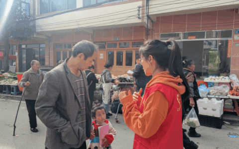 修文县洒坪镇组织青年志愿者开展关爱留守儿童宣传活动